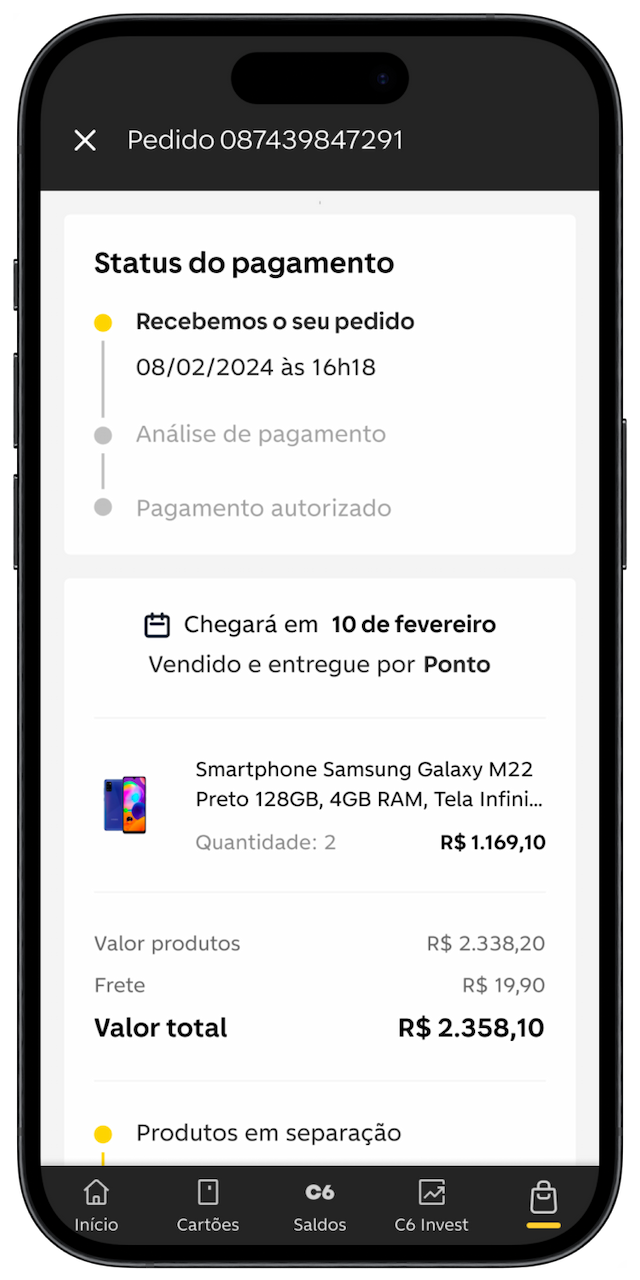 Imagem de celular aberto na tela de conclusão de pedido da C6 Store